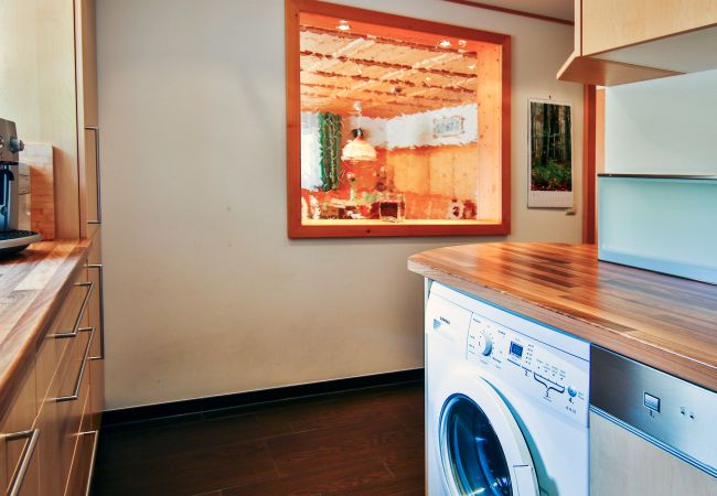 Keuken Birgit Alpenhaus Montafon Keuken met wasmachine in het Birgit Alpenhaus Montafon