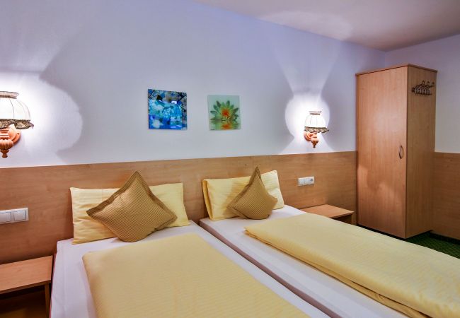 Bedroom Delia Alpenhaus Montafon Bedroom with Double bed in Delia Alpenhaus Montafon