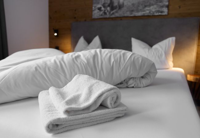 Bedroom Bartgeier 111 Alpin-Resort Montafon Bedroom with Double bed in Bartgeier 111 Alpin-Resort Montafon