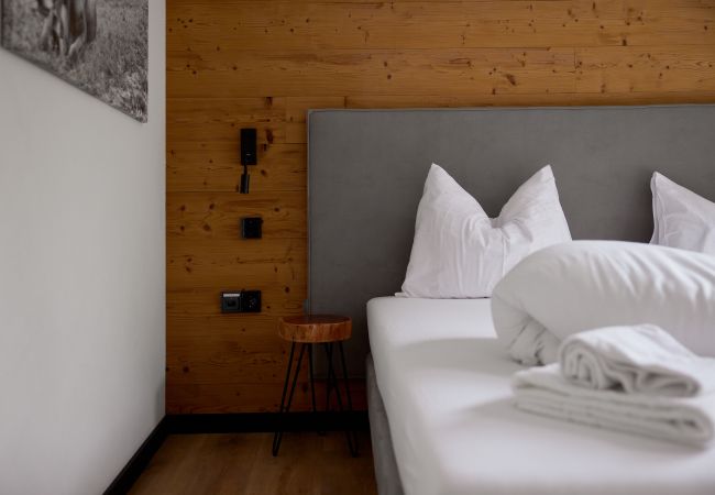 Bedroom Bartgeier 119 Alpin-Resort Montafon Bedroom with Double bed in Bartgeier 119 Alpin-Resort Montafon